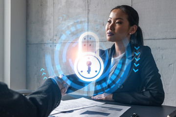 Two woman handshake. Education protection of data hologram. Multiexposure. International business.