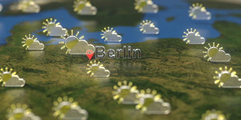 Partly cloudy weather icons near Berlin city on the map, weather forecast related 3D rendering