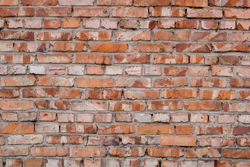 Wall of red bricks. Texture or background of bricks.