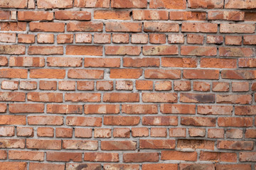 Wall of red bricks. Texture or background of bricks.