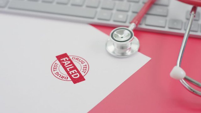 DRUG TEST FAILED stamp on the paper, doctor's workplace