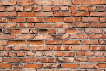 Wall of red bricks. Texture or background of bricks.