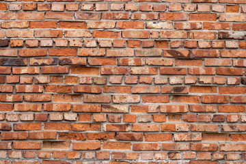 Wall of red bricks. Texture or background of bricks.