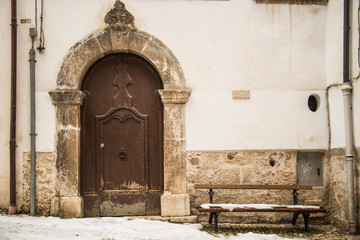 Old wooden italian door in the small village of Scanno