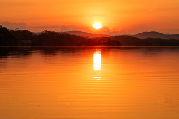 Naklejka premium Peaceful sunset time above lake near Puerto Escondido in Mexico