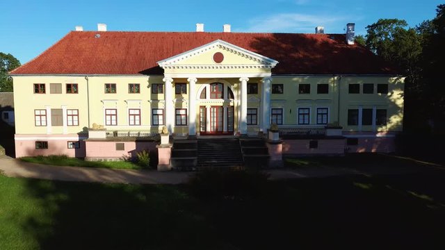 Aerial View of the Durbe Manor Castle, Tukums, Latvia. Old Mansion of Former Russian Empire. Dron 4K Video