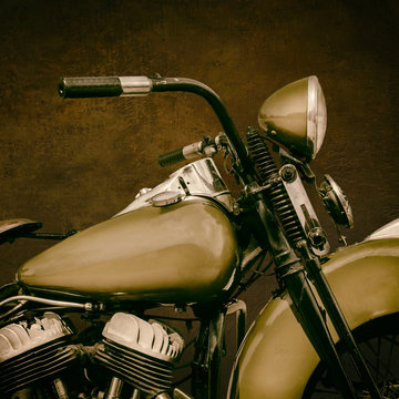 Sepia toned image of a fourties vintage motorcycle