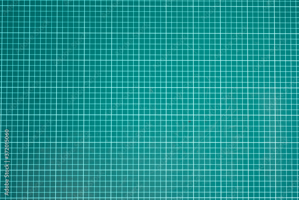 Aufkleber the base of the emerald color is drawn into squares. convenient texture for markup. green leaf in a 