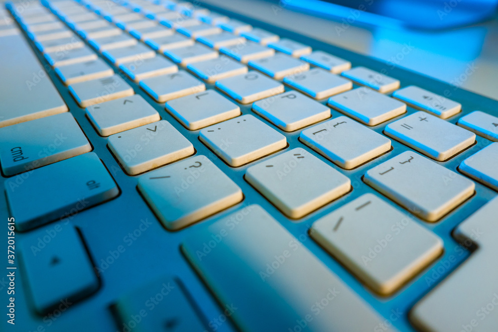 Poster keyboard close-up. white keyboard buttons with symbols. printing. modern aluminum keyboard. working 