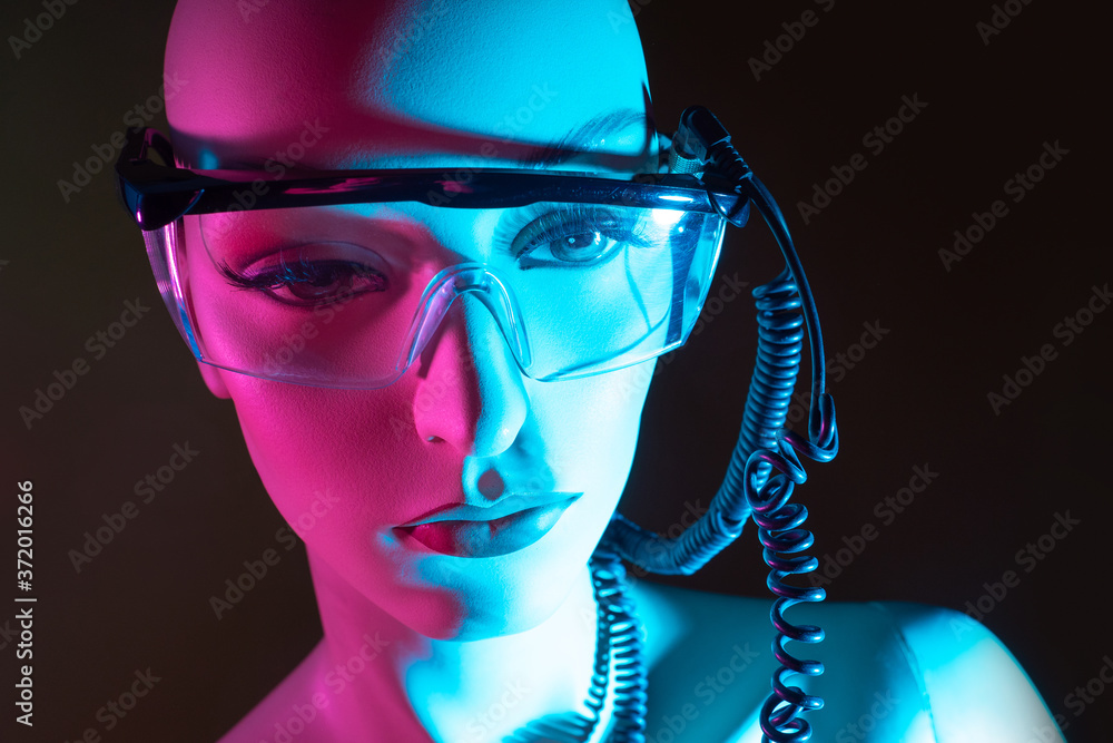 Poster the concept of artificial intelligence. a female robot. controlled robot. a cyborg with a beautiful 