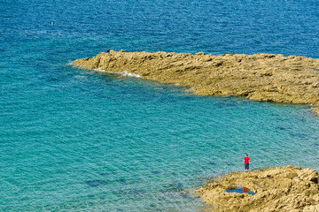 rocks along the Promenade De La Malouine in Dinard, France