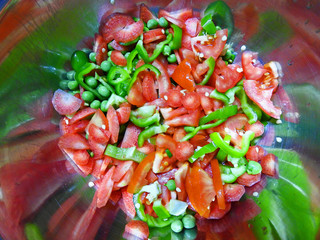 chopped raw carrot capsicum tomato green pee