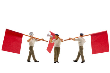Miniature people holding Megaphone with flags isolated on white background with clipping path