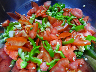 chopped raw carrot capsicum tomato green pee