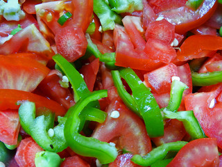 chopped raw carrot capsicum tomato green pee