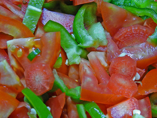 chopped raw carrot capsicum tomato green pee