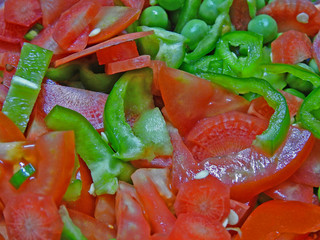 chopped raw carrot capsicum tomato green pee