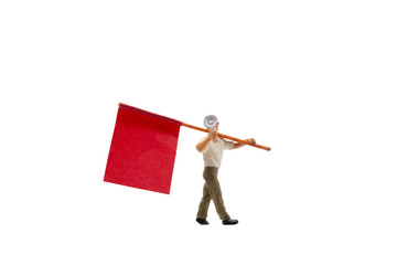 Miniature people holding Megaphone with flags isolated on white background with clipping path