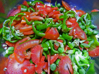 chopped raw carrot capsicum tomato green pee