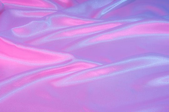 Fototapeta Iridescent neon background. Holographic Abstract soft pastel colors backdrop. Hologram Foil  Aesthetic. Trendy vaporwave creative gradient.