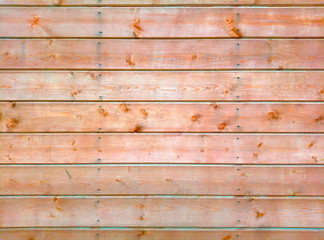 Naklejka premium Background from wooden boards for design wooden texture orange