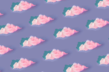 Pattern made of clouds of cotton wool in holographic neoon colors on pastel purple background. Cyberpunk aesthetic concept art. Minimal surrealism.