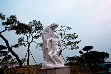 Religion pray faith.Virgine Mary statue.