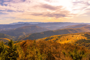 Panorama of autumn mountains and sky at sunset