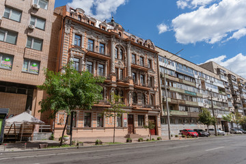 Kyiv (Kiev), Ukraine - August 08, 2020: Different buildings which were built during different periods (Soviet and pre-revolutionary) and have very big architectural difference