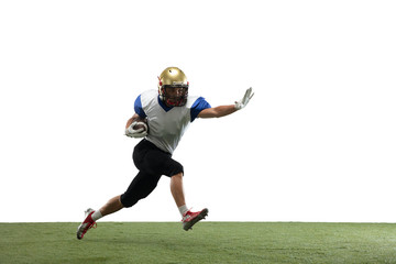 Fototapeta na wymiar In action. American football player isolated on white studio background with copyspace. Professional sportsman during game playing in action and motion. Concept of sport, movement, achievements.
