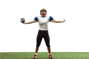 Hero, strong. American football player isolated on white studio background with copyspace. Professional sportsman during game playing in action and motion. Concept of sport, movement, achievements.