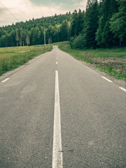 Winding road or street through nature. Valea Cerbului street( Deer's Valley street) in Busteni, Romania