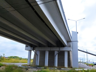 Fototapeta na wymiar bridge over the road, bottom view