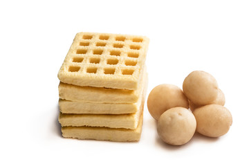 Stack of potato waffles isolated on white