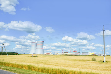 Fototapeta na wymiar NPP, Cooling towers of the nuclear power plant which is under construction in Astravets, Grodno region, Belarus. july 2020