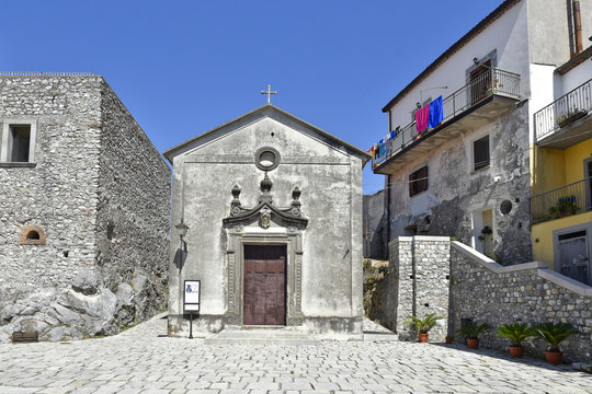 A narrow street among the old houses of Aieta, a rural village in the Calabria region.