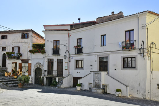 A narrow street among the old houses of Aieta, a rural village in the Calabria region.