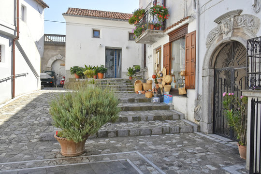 A narrow street among the old houses of Aieta, a rural village in the Calabria region.