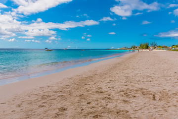 Fototapeta na wymiar A view along Carlisle beach in Bridgetown, Barbados