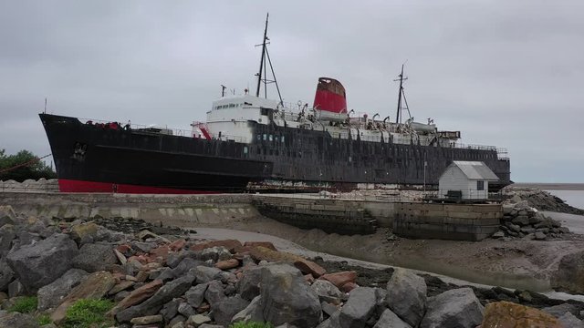 Mostyn Docks, River Dee, North Wales, UK. TSS Duke of Lancaster abandoned railway steamer ship docked in Mostyn Docks, River Dee, North Wales