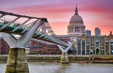 A view across the River Thames at dusk towards St. Paul's Cathedral in London, UK.