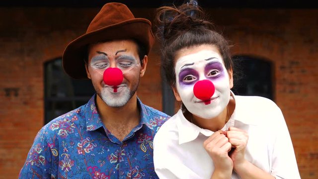 Amazed clowns are happy about something
