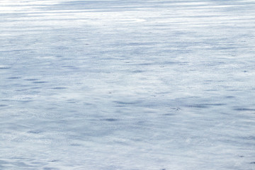 Texture of snow covered ice, winter background