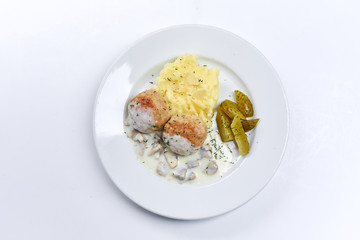 meatballs with mashed potato and sauce