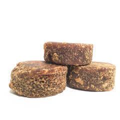 3 brown sugar (gula merah) isolated on white background 