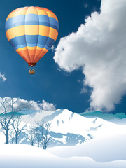 Picturesque rural snow covered winter mountain scene with hot air balloon set against a cloudy blue sky