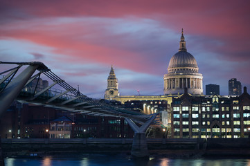 Naklejka premium A view across the River Thames at dusk towards St. Paul's Cathedral in London, UK.