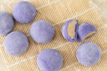 Obraz na płótnie Canvas Purple color taro or yam mochi japanese dessert