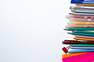 School supplies. Education concept. Stationery. There is a place for an inscription or logo. Photo on white background