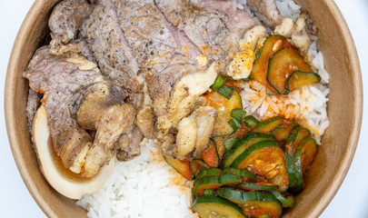 Closed up of take away rice box, lunch box in hard paper bowl on white background